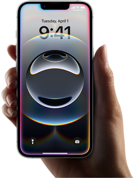 Mão a segurar o iPhone 16e, com um leve brilho colorido ao longo das margens do ecrã total